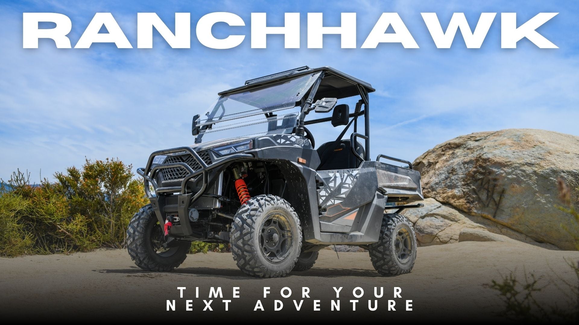 A Denago Powersports RanchHawk 650FI off-road utility vehicle parked outdoors on a dirt path with rocks and shrubs in the background. Large white text at the top reads 'RANCHHAWK' and smaller text at the bottom reads 'TIME FOR YOUR NEXT ADVENTURE'.